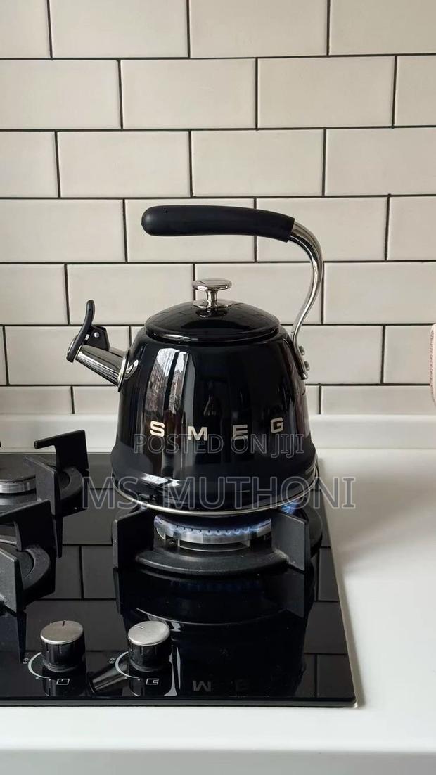 Black Smeg 50's Style Whistling Kettle Features a 2.3-Liter Capacity