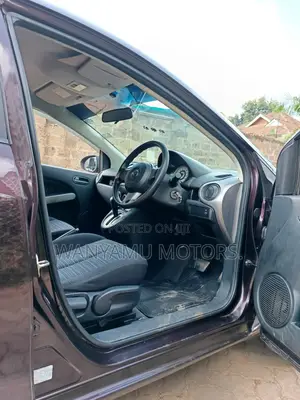 Mazda Demio 2011 Brown