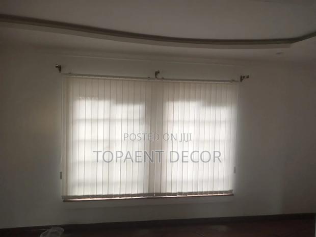 Small Change , Massive Impact With White Vertical Office Blinds