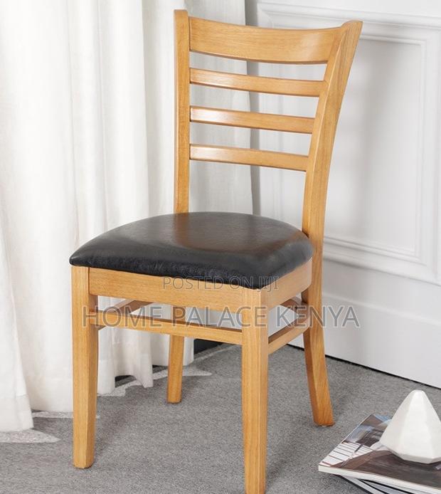 Home Chair: Armless Leather Padded Vintage Wooden Chair