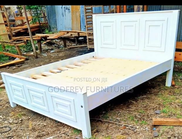 White Wooden 5 by 6 Bed
