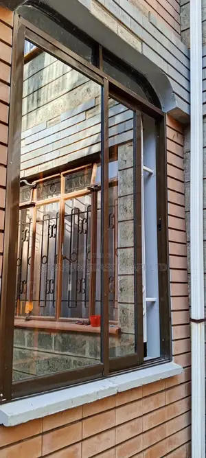 Brown Coated Sliding Windows in Kenya
