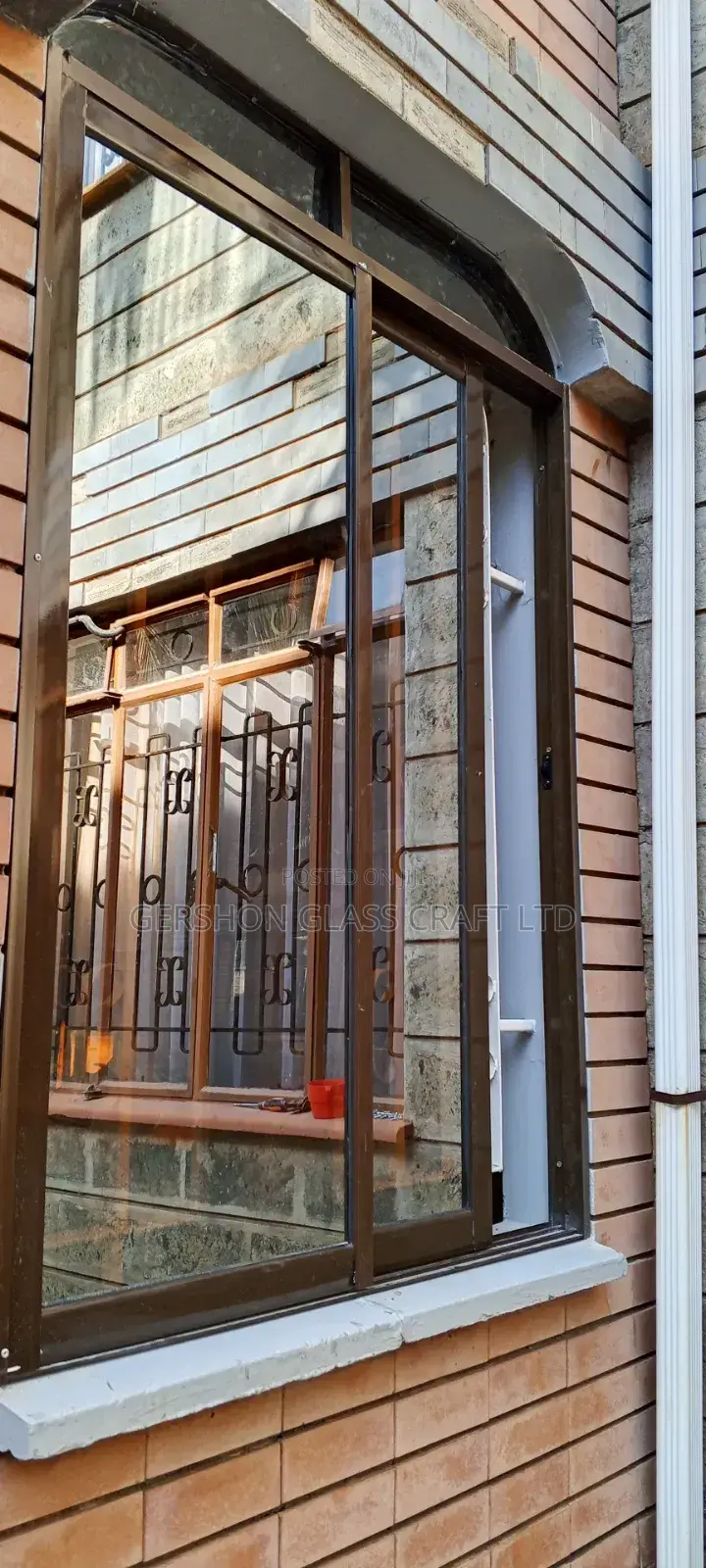 Brown Coated Sliding Windows in Kenya