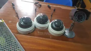 A Set Of 4 Cctv Cameras And 1 Power Supply