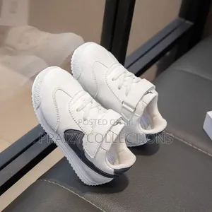 Kids Sneakers With a Tick