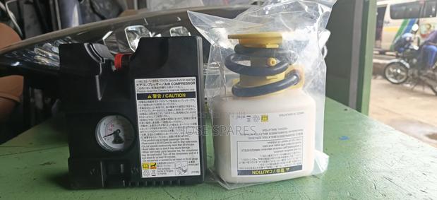 Title: Toyota Genuine Tire Repair Kit (Air Compressor + Sealant)