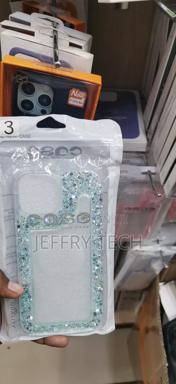 iPhone 14 Pro Max Embedded Light Blue and Silver Glitter Chunks Case