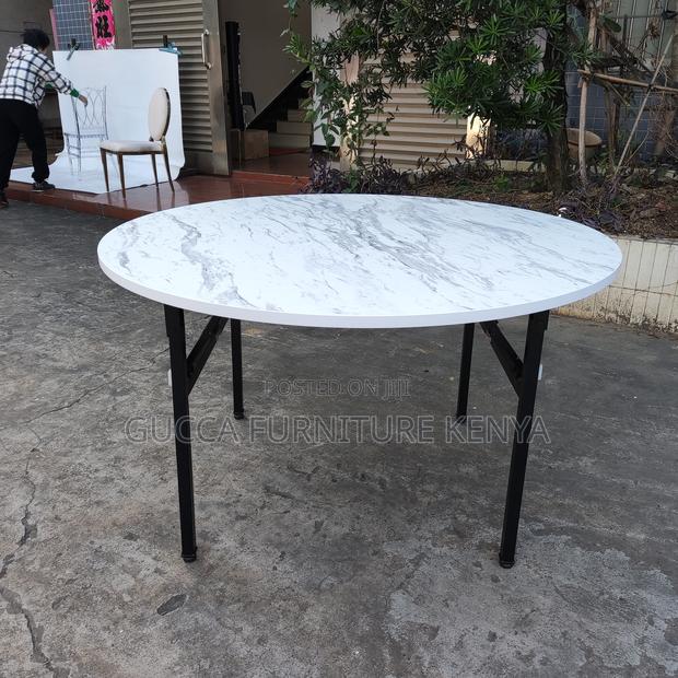 Round White Restaurant Table. - thumbnail 7