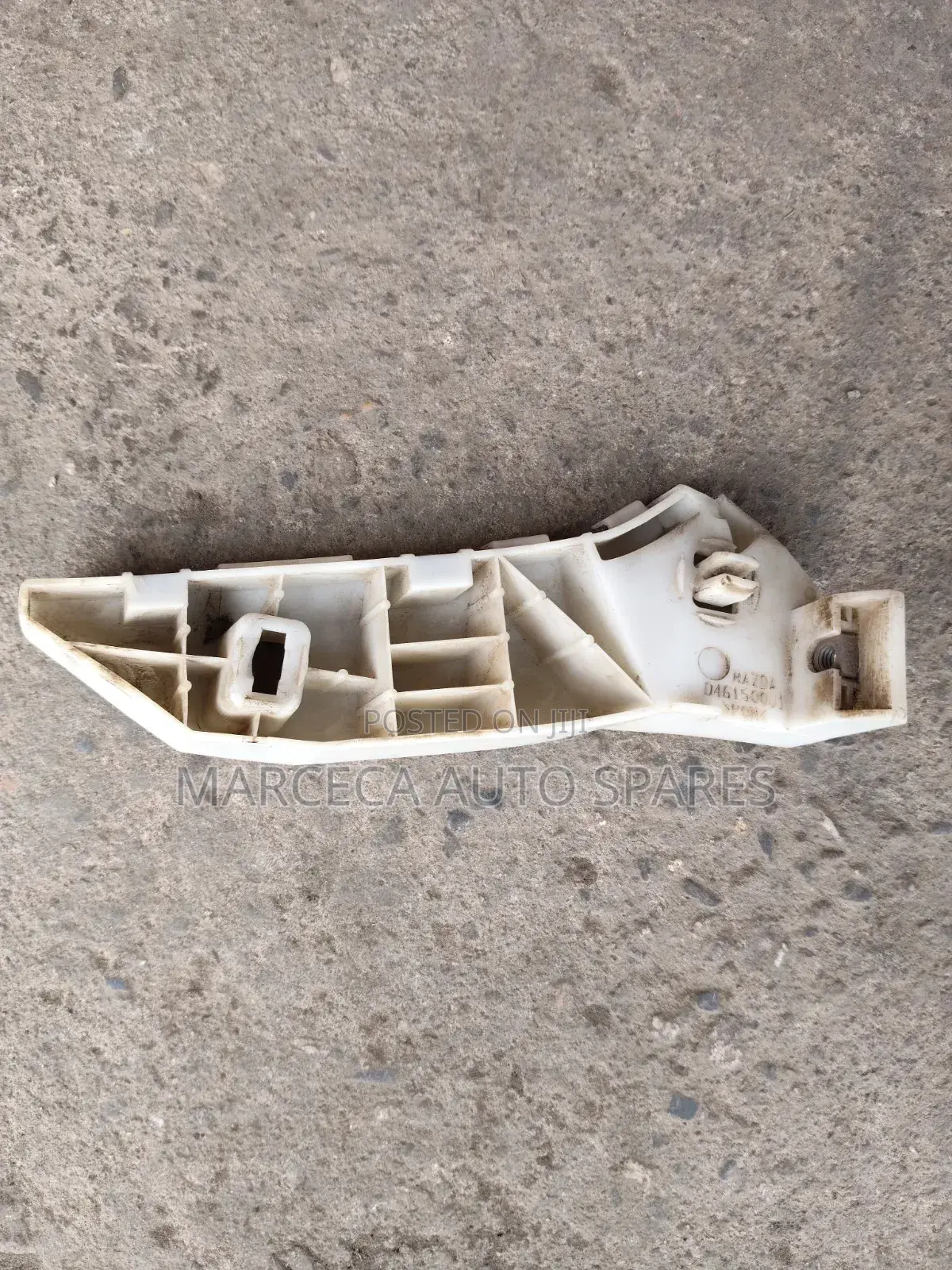Mazda Verisa Bumper Slide Retainer