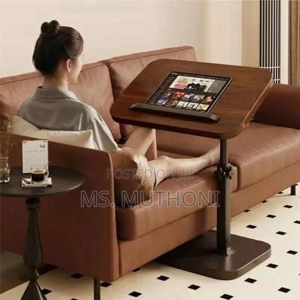 Adjustable Walnut-Finished Tabletop and a Black Metal Stand.