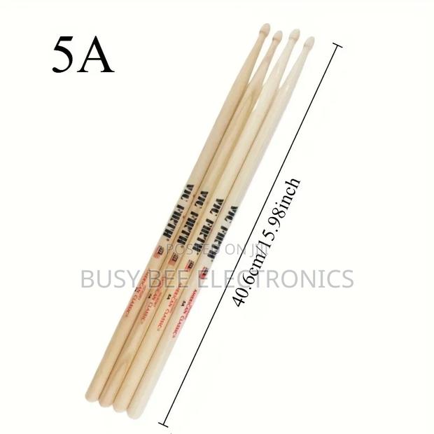 A Set of 2 5a Walnut Drumsticks, Perfect for Jazz Drummers. - thumbnail 4
