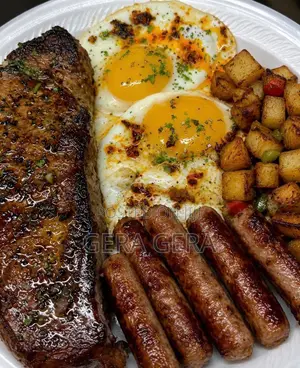 Steak, Eggs, Sausage Links, and Breakfast Potatoes