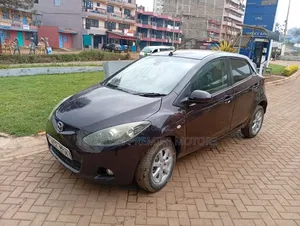 Mazda Demio 2011 Brown