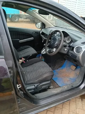 Mazda Demio 2011 Brown