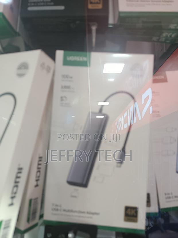 Ugreen 10-in-1 Usb-C Hub Features a Dark Gray Aluminum Finish and Su