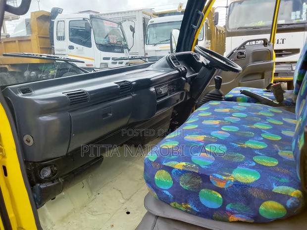 Isuzu NQR 2013 Yellow - thumbnail 8