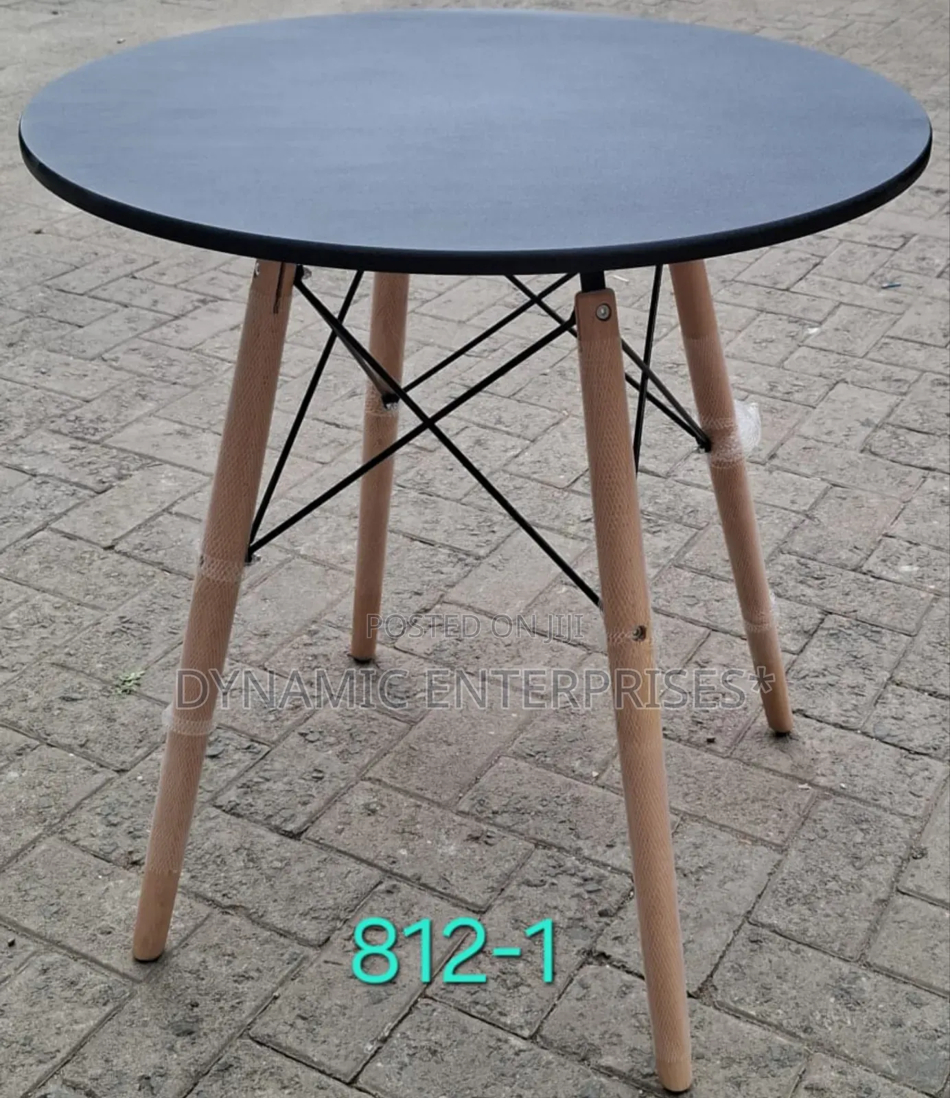 Dining Table Features a Smooth, Matte White Top