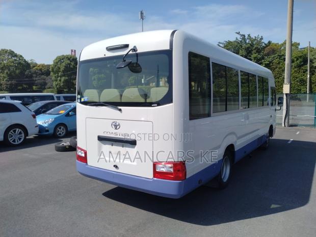 Toyota Coaster 2020 White - thumbnail 2