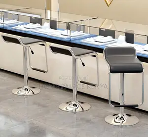 Bar Stool: Rotating Leather Stool With Footrest