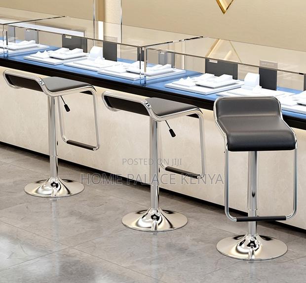 Bar Stool: Rotating Leather Stool With Footrest - thumbnail 3