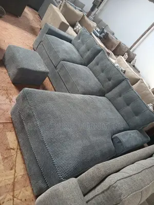 6 Seater L Seat Textured Gray Sofa With Ottoman
