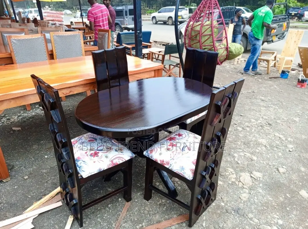 4 Seater Oval Wooden Dining Set With Cushioned Chairs