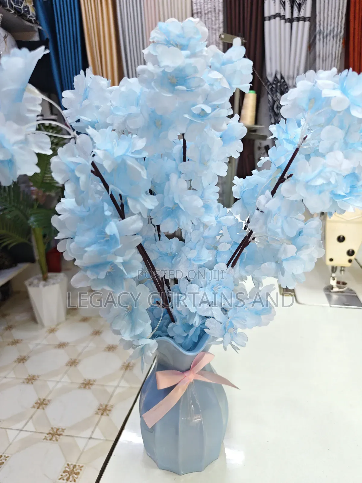Sky Blue Artificial Flowers With Blue Vase