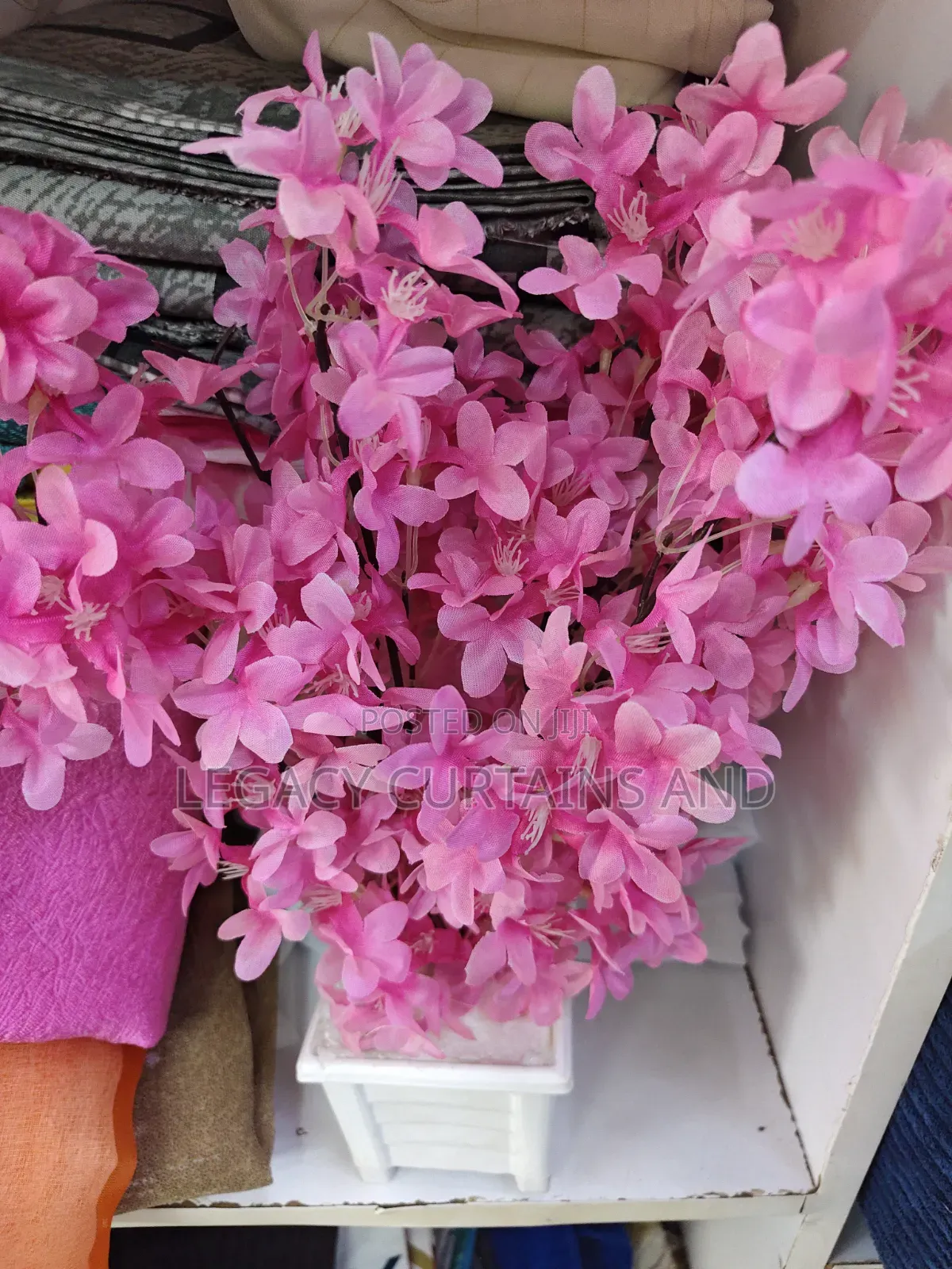 Artificial Pink Flowers With White Vase