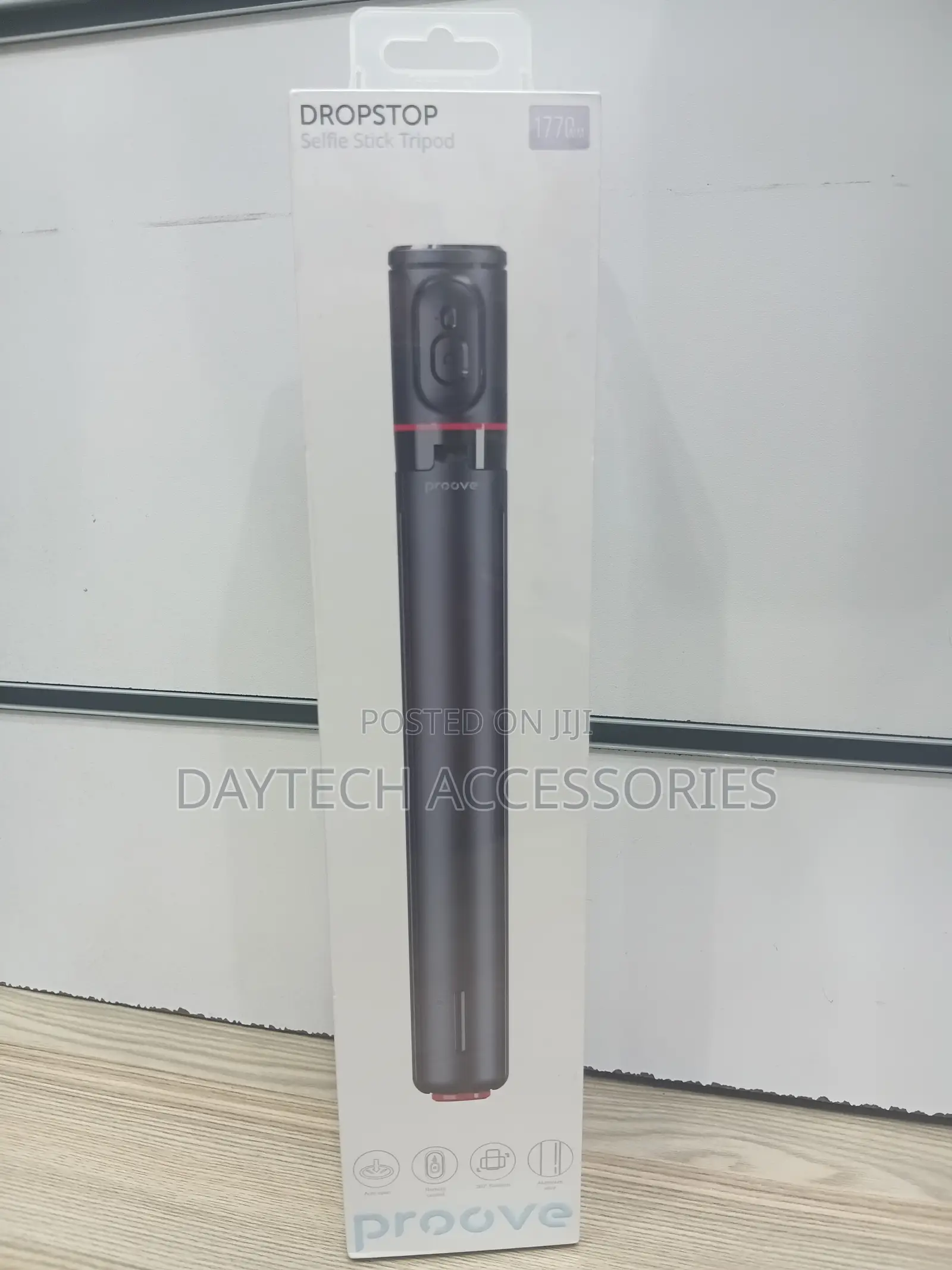 This Is a Proove Dropstop Selfie Stick Tripod Stand in Black