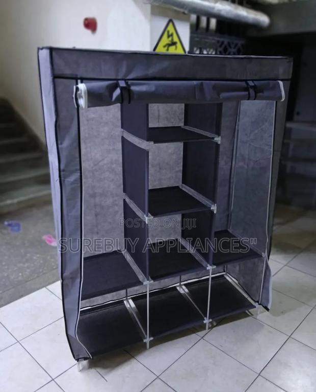 Spacious 3 Column Metallic Clothes Wardrobe With Shelves