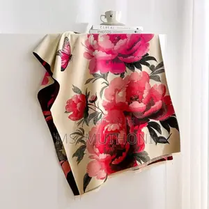 Cashmere Scarf Features a Bold Red and Pink Floral Design