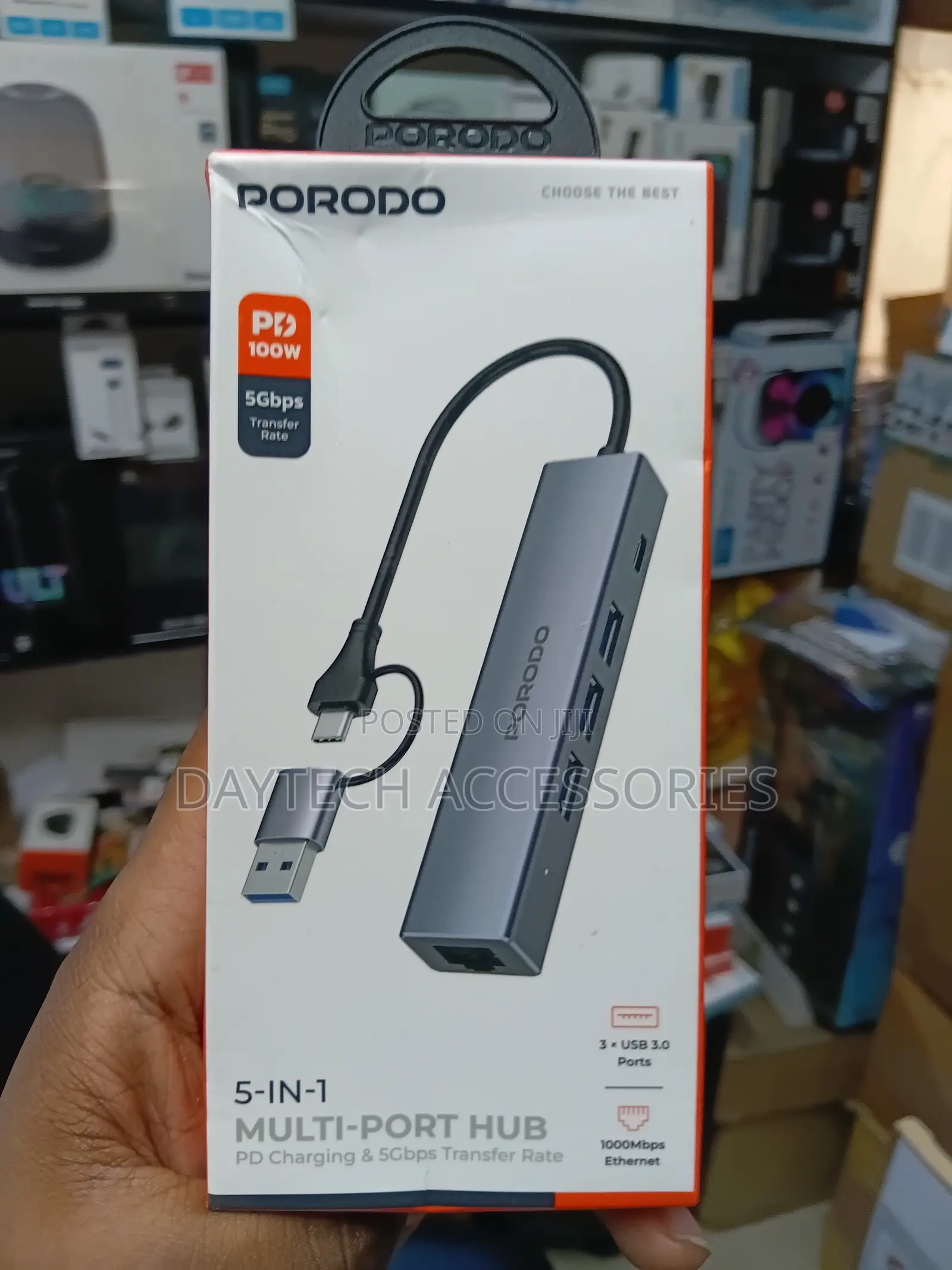 This Is a Porodo 5-in-1 Multi-Port Hub in Gray Aluminum Alloy.