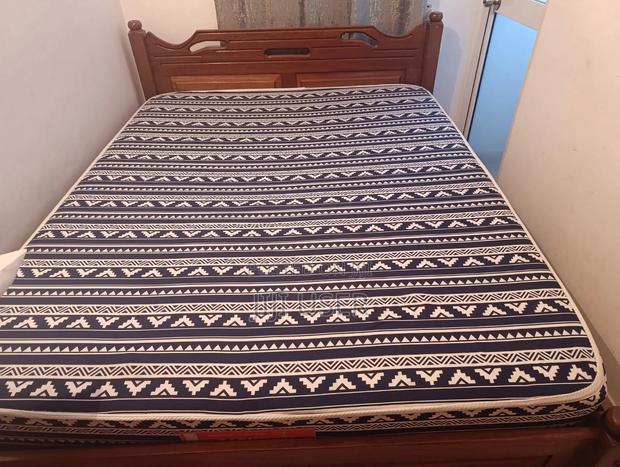 A 5 by 6 Fairly Used Bed for Sale