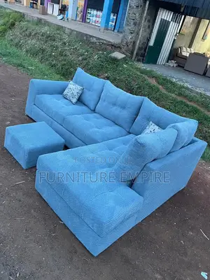 6 Seater Light Blue Tufted L-Shaped Sofa With Footrest