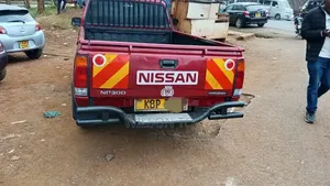 Nissan Hardbody 2014 Maroon