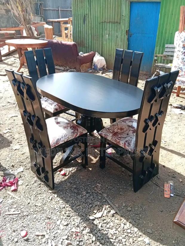 Oval Castlell Solid 4-Seater Dinning Table Set