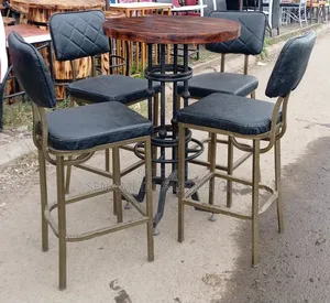 Rustic Wooden Bar Table Set With Heavy-Duty Metal Stools.