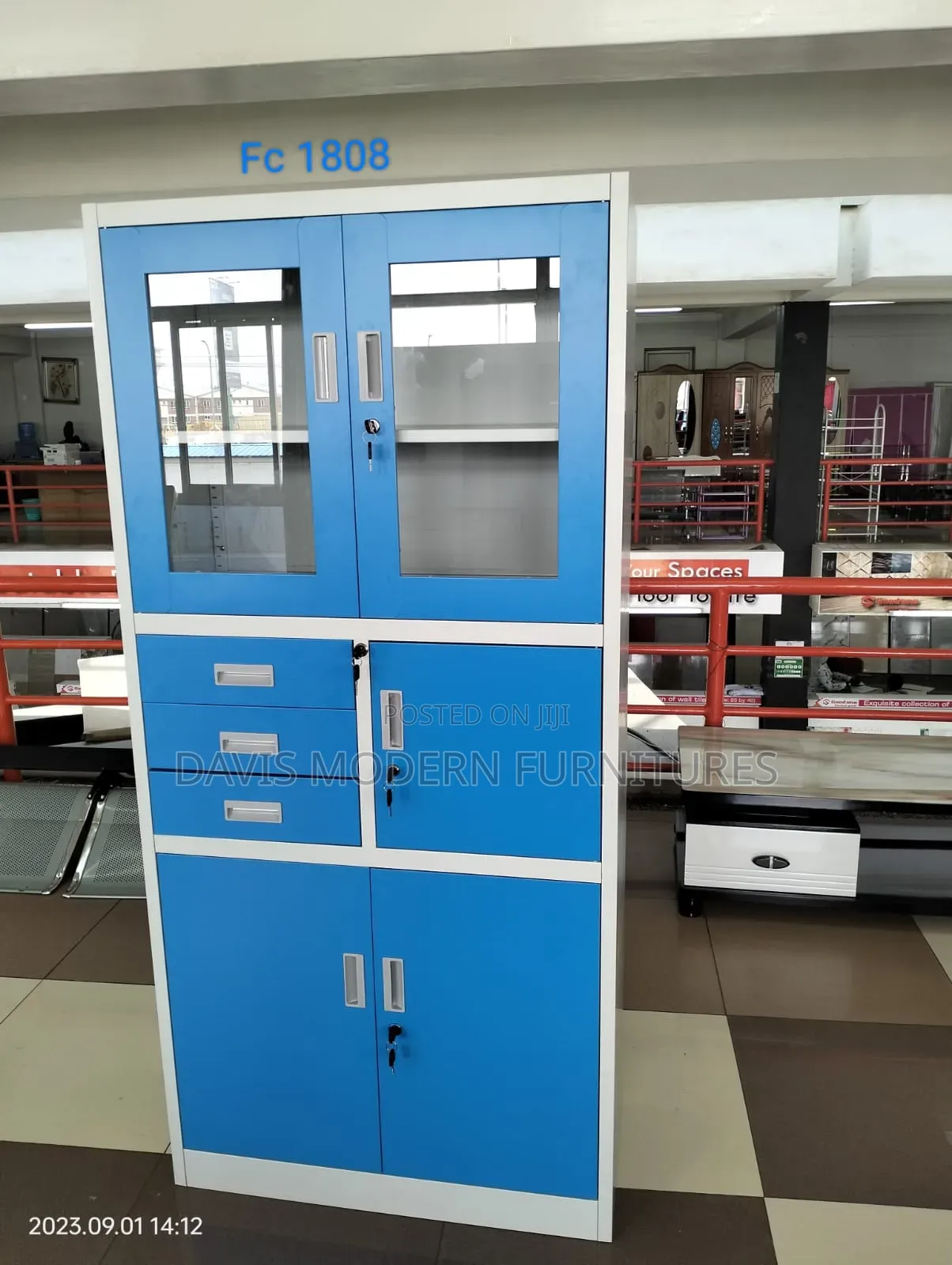 A Tall Blue and White Office Storage Cabinet