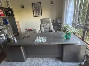 Executive Office Set With a Desk, Reclining Chair, and Wall Cabinet