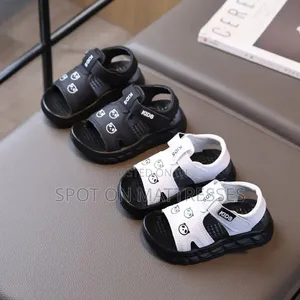 Kids' Unisex Sandals Black and White. Delivery Services Available.