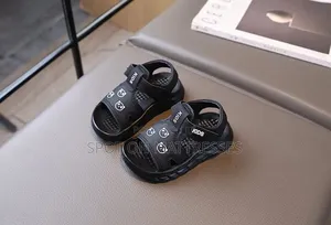 Kids' Unisex Sandals Black and White. Delivery Services Available.