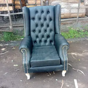 High Back Wing Chair in Black Leather.