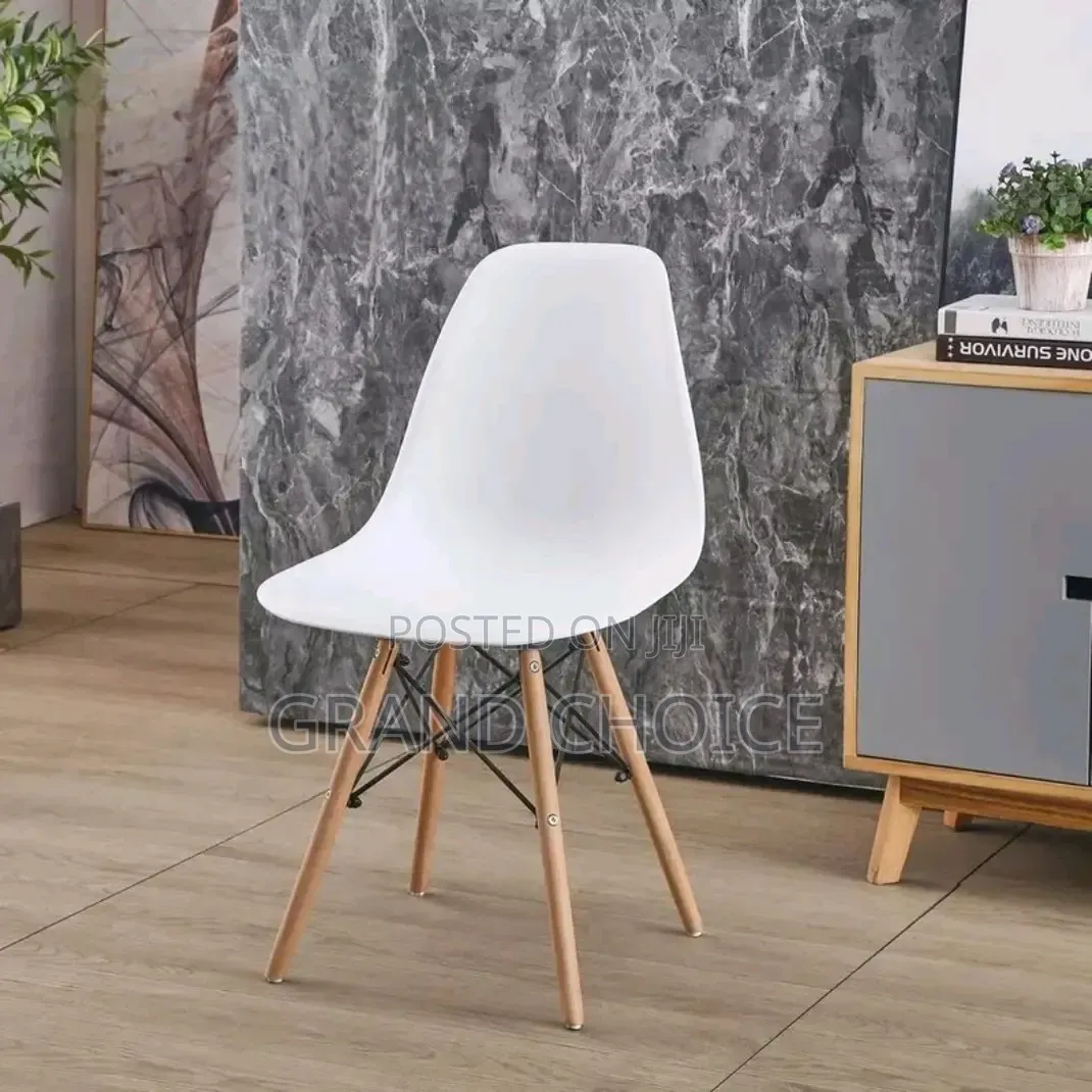 White Plastic Eames Chairs