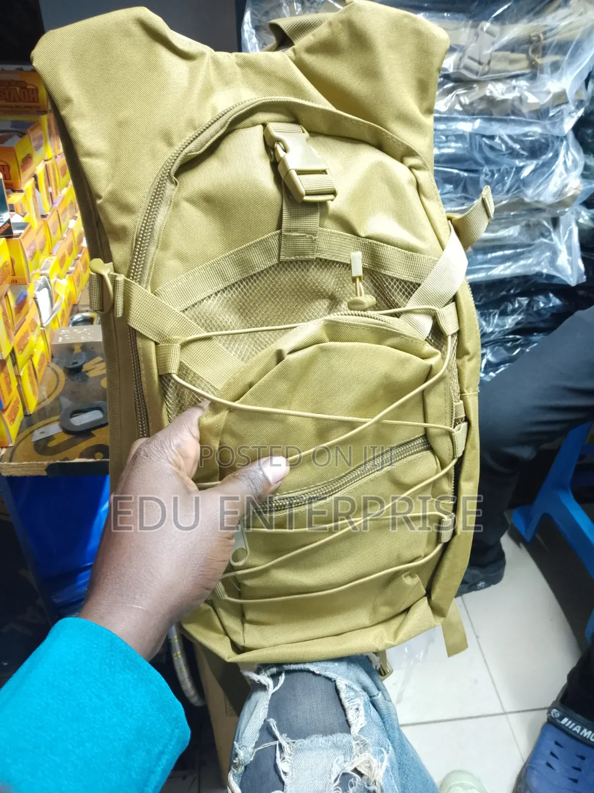 Brown Backpack and 3little Hydration Backpack