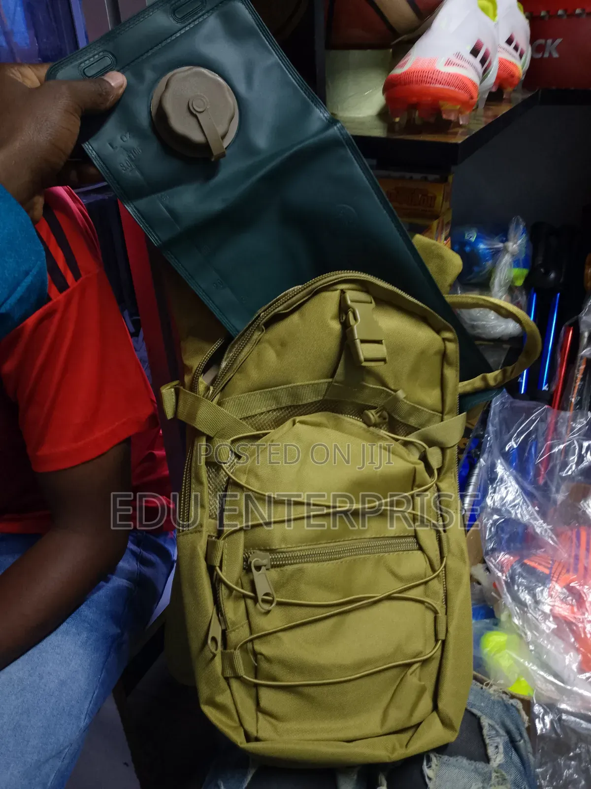 Brown Backpack and 3little Hydration Backpack