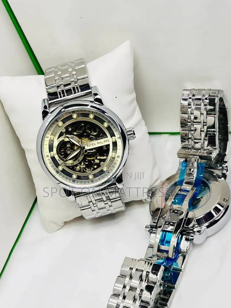 Patek Phlippe Skeleton Automatic Watch. Gold, Silver and Black.