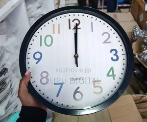 *Rainbow Font Wall Clocks.*
 Measuring 30x4x30 Cm (12x12x1.4 Inches)