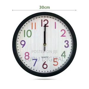 *Rainbow Font Wall Clocks.*
 Measuring 30x4x30 Cm (12x12x1.4 Inches)