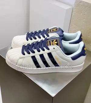 Adidas Superstar “ White Navy “
Sneakers