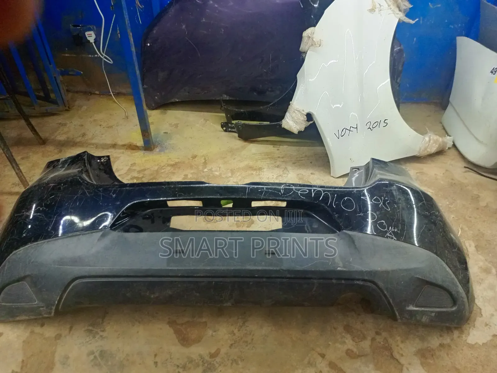 Clean Mazda Demio Rear Bumper 2013